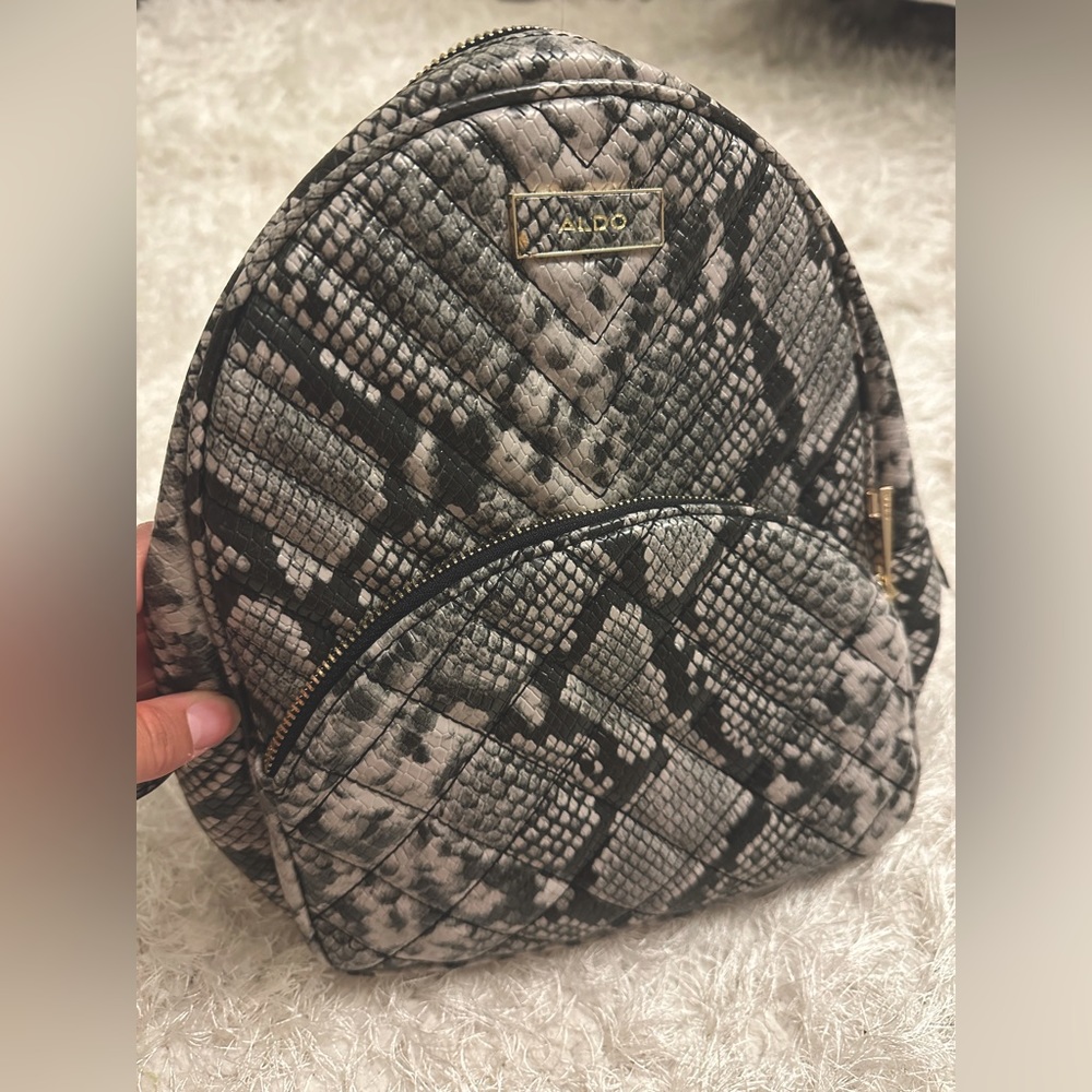 Aldo small snakeskin pattern backpack